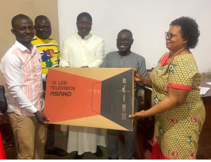 NDC'S PARLIAMENTARY CANDIDATE FOR TANO SOUTH, CHARLES ASIEDU, ATTENDS TO THE NEEDS OF JOSCO