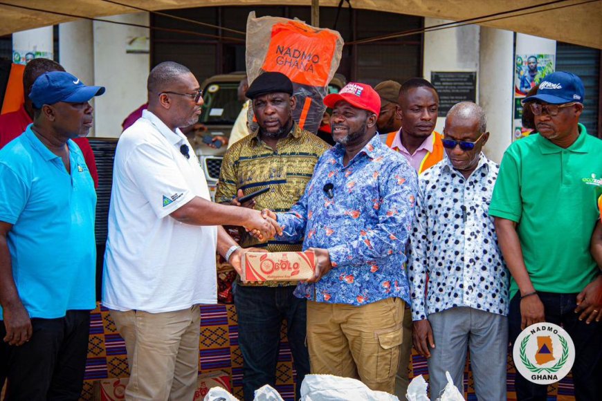 DIRECTOR - GENERAL OF NADMO TOURS DISTRICTS AFFECTED BY SPILLAGE OF AKOSOMBO DAM, PRESENTS RELIEF ITEMS