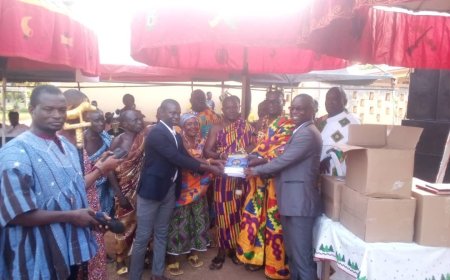 Ahafo Fianko Chief enrolls 337 students on NHIS, distributes 1,000 exercise books